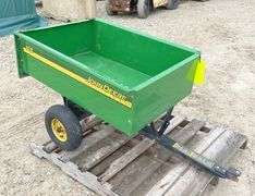 John Deere 10S dump lawn cart