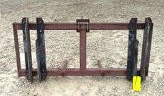 Pin on bale spear for loader w/ adjustable brackets