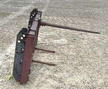 Pin on bale spear for loader w/ adjustable brackets