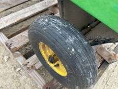 John Deere 10S dump lawn cart