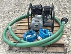Unused Red Lion 2" gas water pump w/ hoses