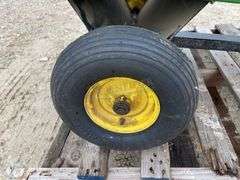 John Deere 10S dump lawn cart