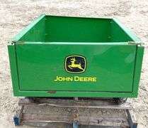 John Deere 10S dump lawn cart