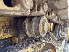 John Deere 555G crawler loader