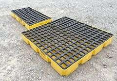 2 Eagle poly spill containment platforms, 1 has a crack