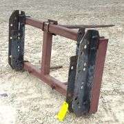 Pin on bale spear for loader w/ adjustable brackets