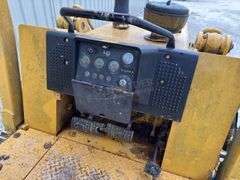 John Deere 555G crawler loader