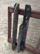 Pin on bale spear for loader w/ adjustable brackets