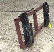 Pin on bale spear for loader w/ adjustable brackets