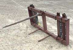 Pin on bale spear for loader w/ adjustable brackets