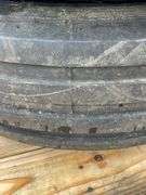 Pair of 16" 16-ply tires on 8-lug JD rims