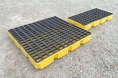2 Eagle poly spill containment platforms, 1 has a crack