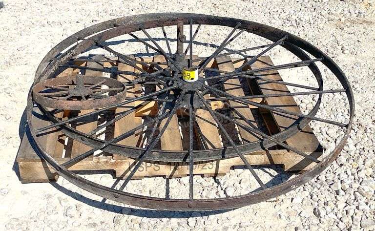 2- 55" antique iron implement wheels