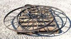 2- 55" antique iron implement wheels