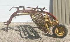 New Holland 256 side delivery hay rake