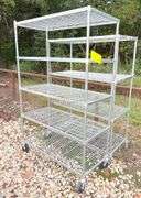 2 metal rolling shelves up to 4' wide