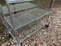 2 metal rolling shelves up to 4' wide