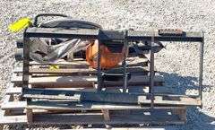 Unused Skid Pro skid steer auger w/ 2 augers, from the estate of Dr. Ken Buchmann