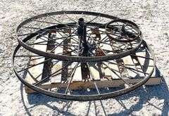 2- 55" antique iron implement wheels