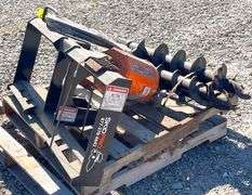 Unused Skid Pro skid steer auger w/ 2 augers, from the estate of Dr. Ken Buchmann