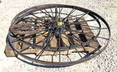 2- 55" antique iron implement wheels