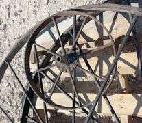 2- 55" antique iron implement wheels