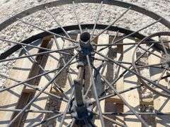 2- 55" antique iron implement wheels