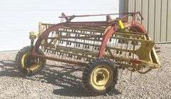 New Holland 256 side delivery hay rake