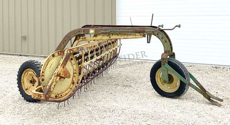 John Deere 670 side delivery hay rake w/ dolly wheels - Schneider ...