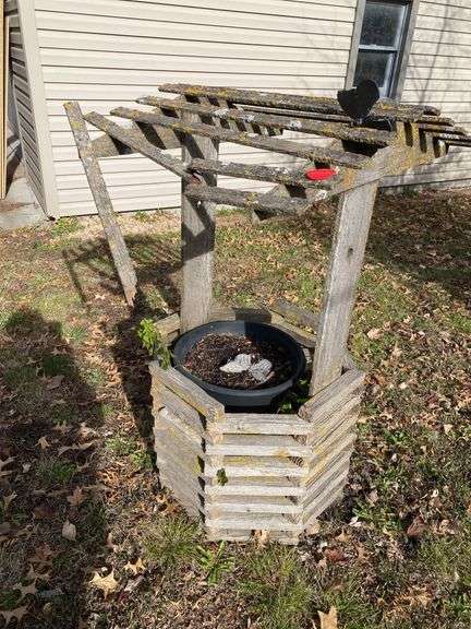 Rugged old wooden Wishingwell planter