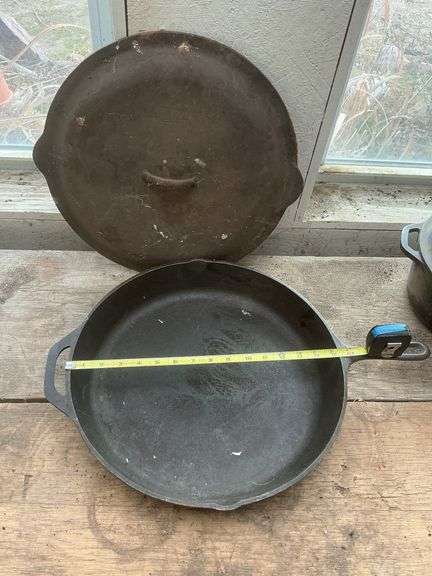 Lodge 15.25 in cast iron skillet with basting lid. Rare find.