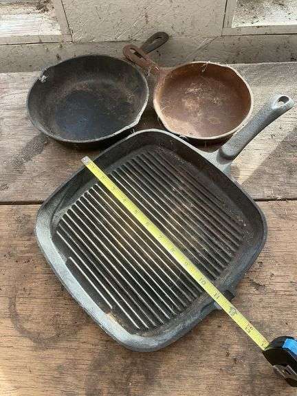 Cast Iron 11 in grill skillet, Cast Iron 8 1/8 in cast iron pan, & 6 1/2 in cast iron pan.