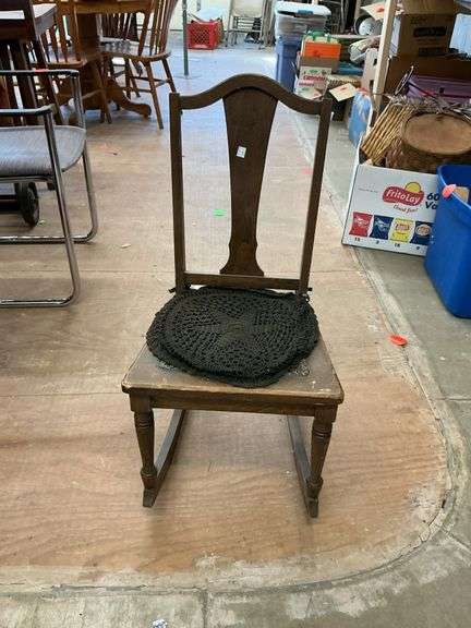 Antique child’s wood rocking chair