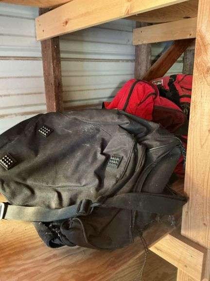 Stack of backpacks and bags - SCHULTIS & SON, INC.