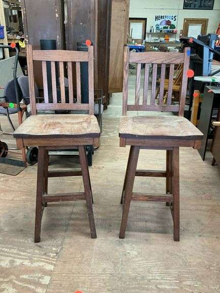 two swivel  wood barstools (seat is 31” high)