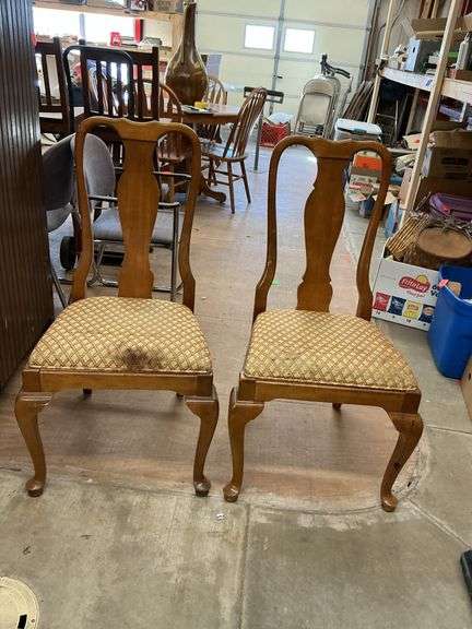 two antique padded with chairs