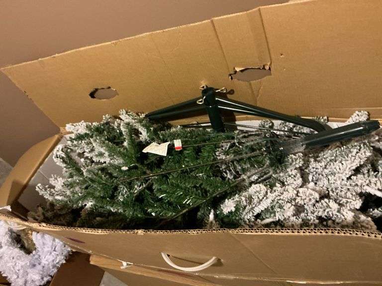 flocked pre-lit Christmas tree 6 or 8 foot not real sure- comes with a