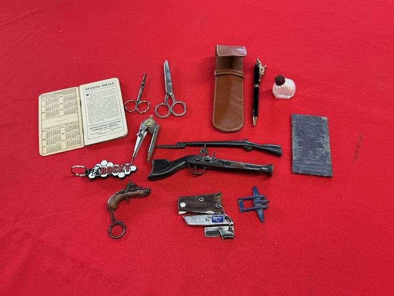 Scissors Gun small replicas of antique guns, scissors, during harvesting machine ...