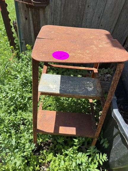 Rusty primitive stool - SCHULTIS & SON, INC.