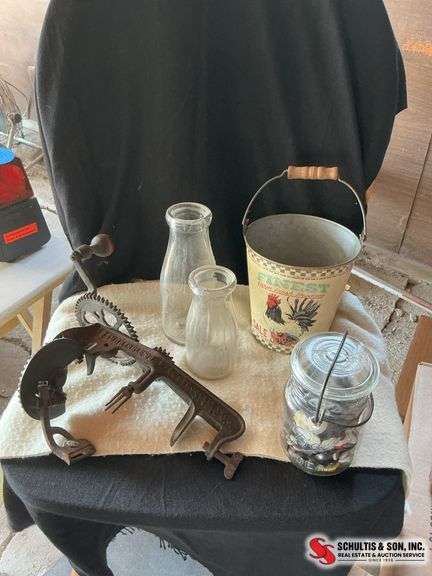 Antique apple peeler & glass milk bottles