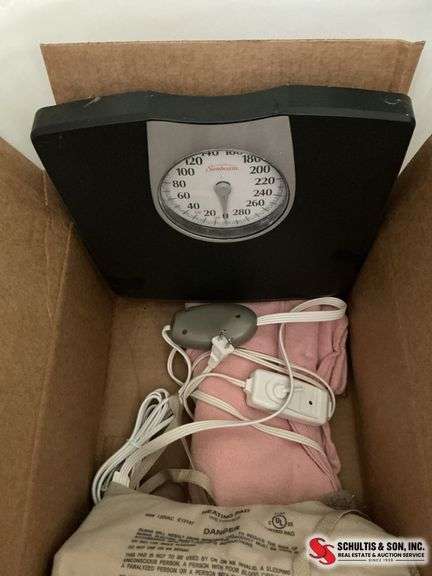 Heating pads and scale