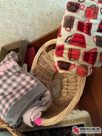 Nice wicker basket with two fleece blankets