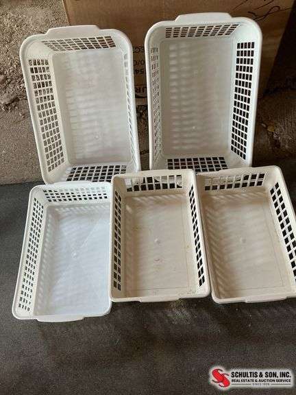 White plastic storage baskets