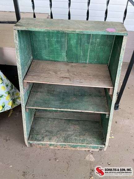 Green rustic shelf with four shelves measure 33 inches tall and 24 3/4 inches long￼ and 16 inch dept