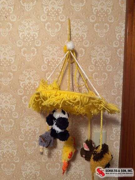 Macrame old baby crib mobile and