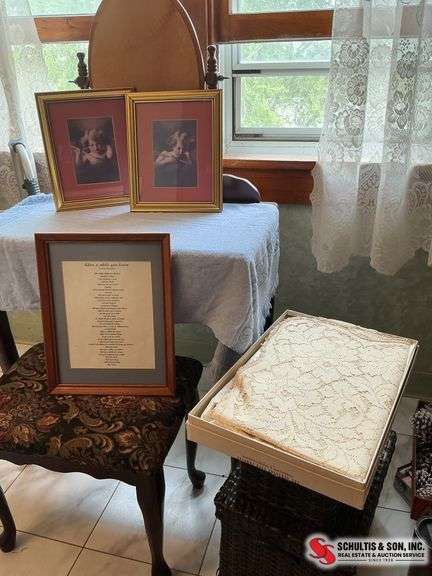 wallhangings and a beautiful lace tablecloth ￼