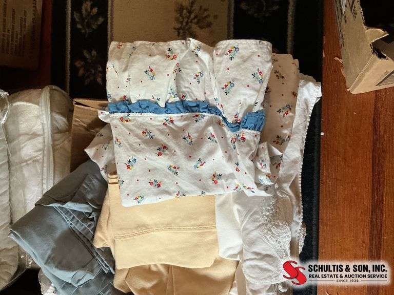 box of pillowcases- sheets and etc. ￼