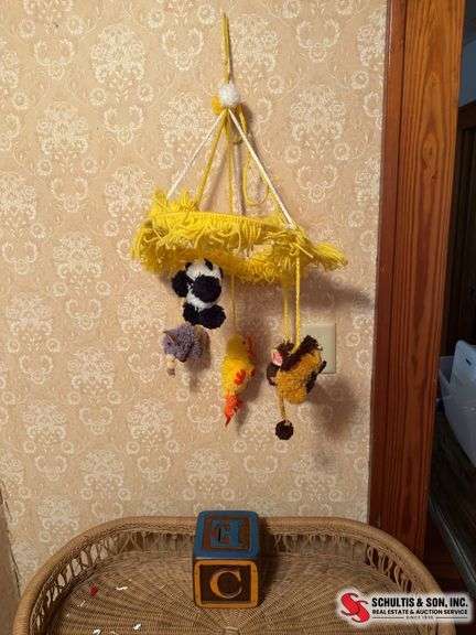 Macrame old baby crib mobile and