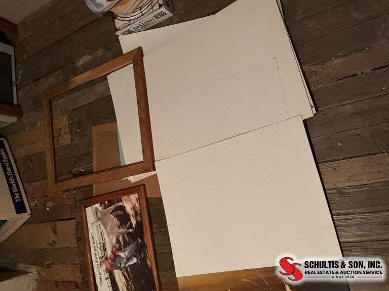 Wood frames- piece of canvas- painting on canvas- pieces of posterboard ￼