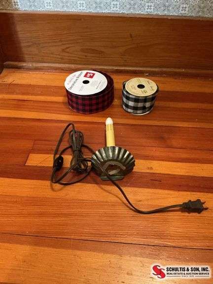 packages of mini lights- bag of pinecones-wall hanging- ribbon ￼